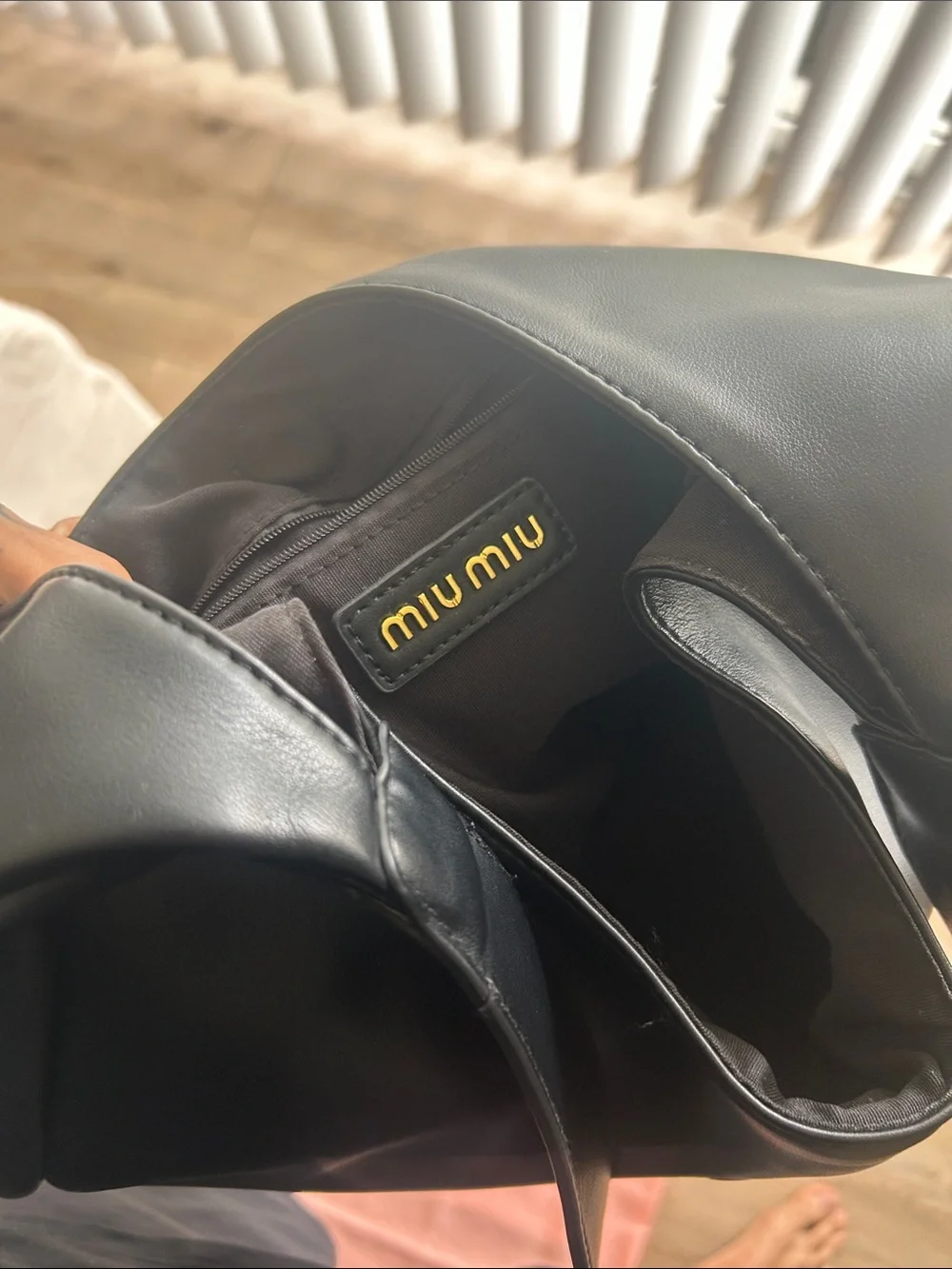 Miu Miu Black Leather Hobo Bag with Embossed Logo